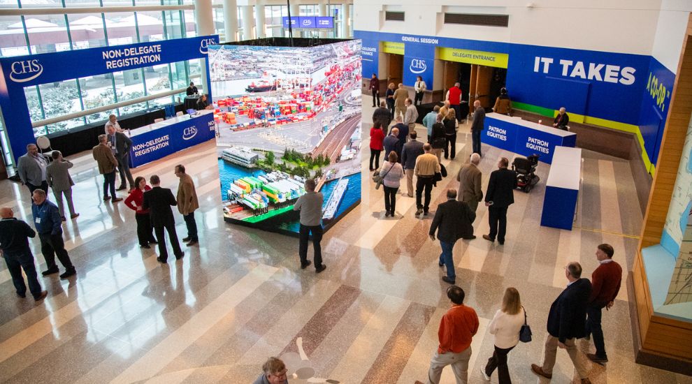 Rows of people facing a stage