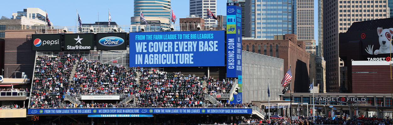 Jumbotron at Minnesota Twins game featuring a CHS digital banner