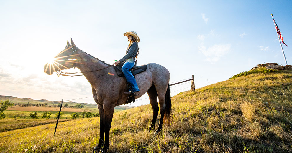 Woman riding a horse