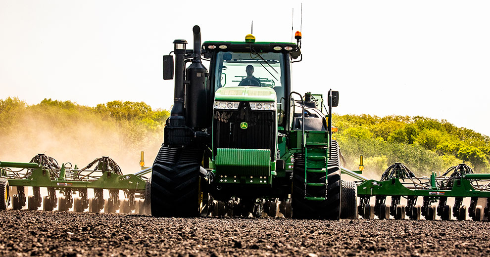 Tractor fertilizing field