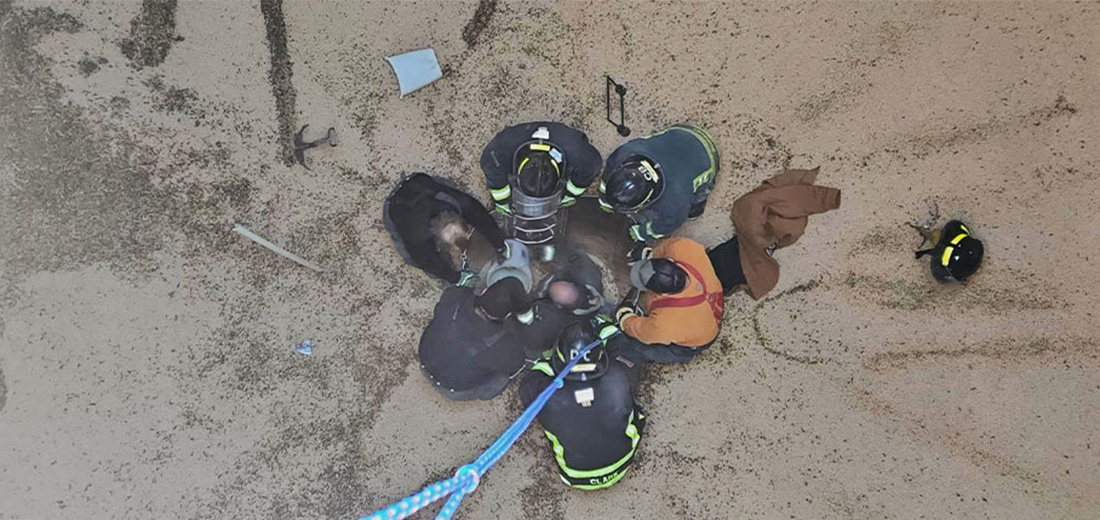 Firefighters doing a grain engulfment rescue