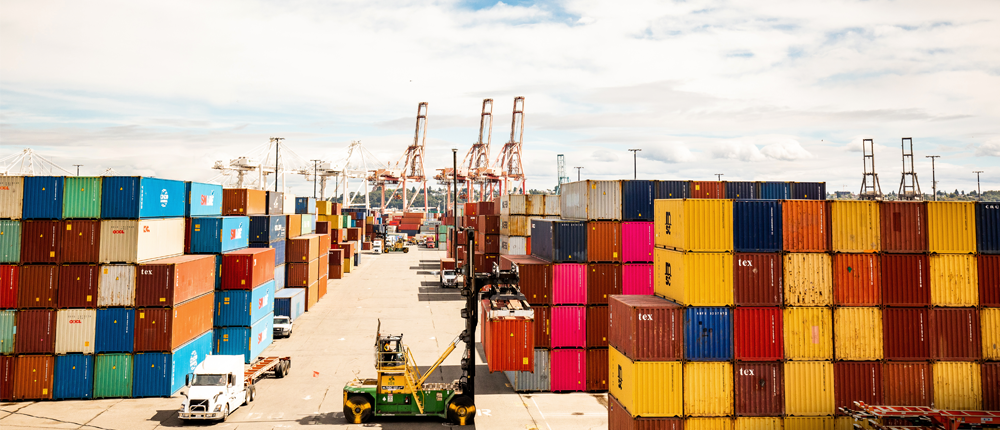 Containers stacked at a shipping port. 
