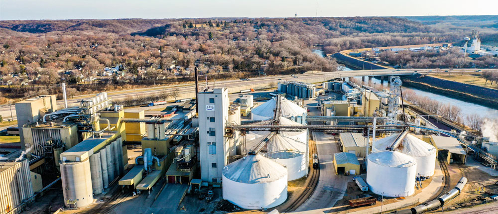 Soybean processing plant by river in Mankato.