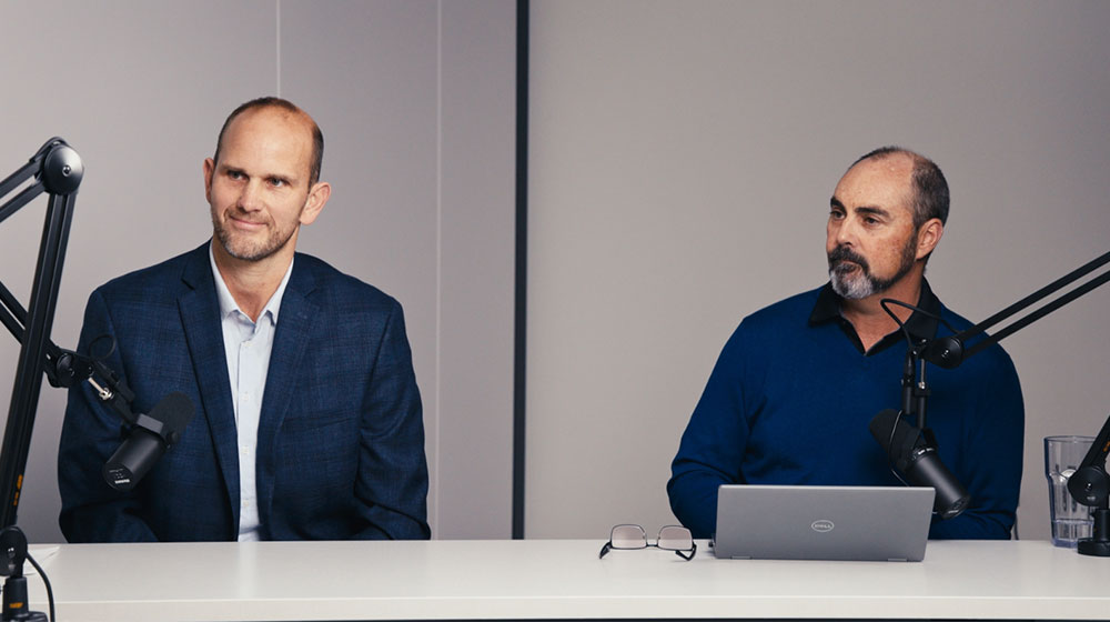 two men talking on a podcast