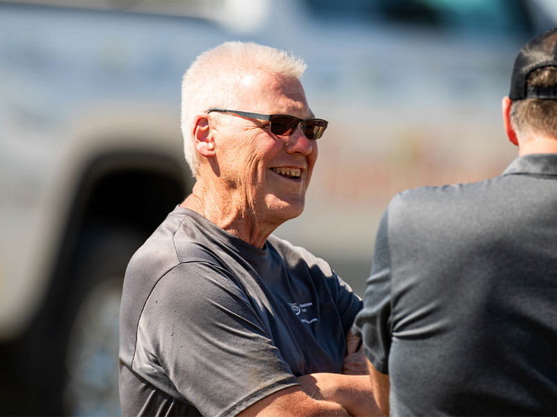 A portrait of man in a field