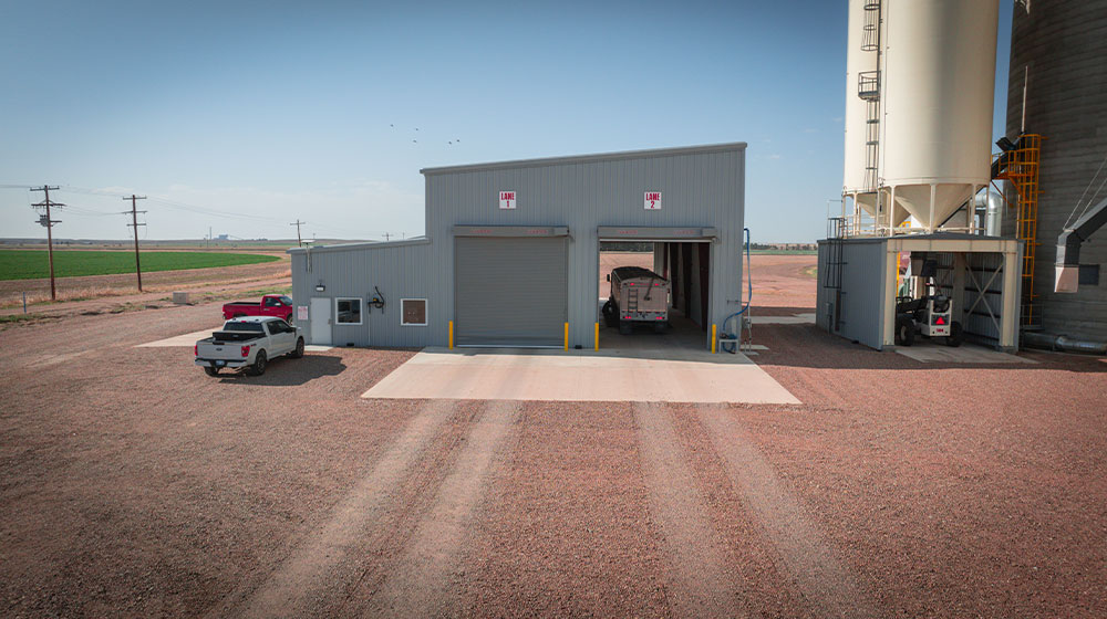 Grain is unloaded from a semi trailer to a grain terminal