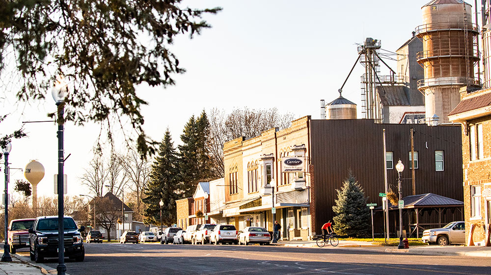 Rural downtown with cars.