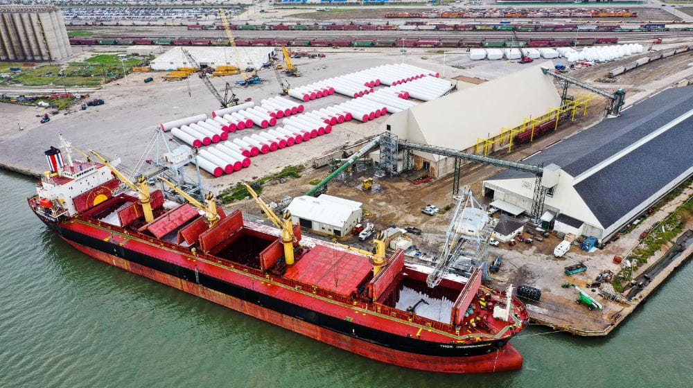 Dry fertilizer being unloaded from a barge in Galveston
